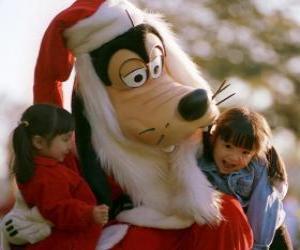 puzzel Goofy verkleed als kerstman knuffelen twee meisjes