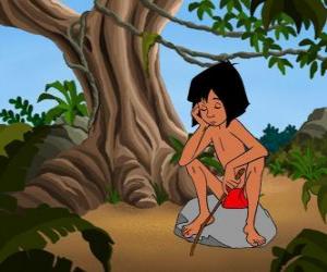 puzzel Mowgli zat op een rots denken
