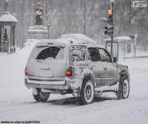 puzzel Auto rijden met sneeuw