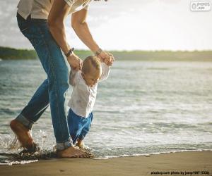 puzzel Baby op de kust