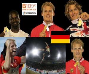 puzzel Christian Reif verspringen kampioen, en Chris Tomlinson Kafétien Gomis (2e en 3e) van het Europees Kampioenschap Atletiek 2010 in Barcelona