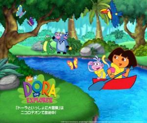 puzzel Dora en haar vriend laarzen aap op een boot