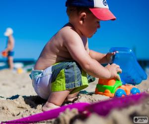 puzzel Een kind spelen op het strand