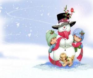 puzzel Groep van spelende kinderen en een hond om een sneeuwpop