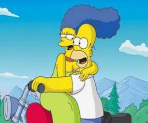 puzzel Homer en Marge Simpsons in motor