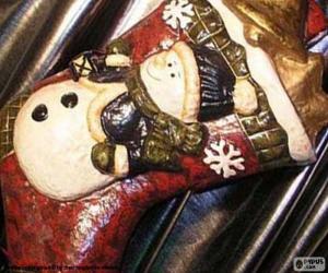 puzzel Kerst boot vol met cadeautjes en versieringen
