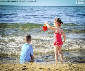 puzzel Kinderen genieten van het strand