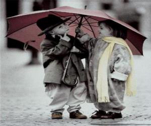 puzzel Kinderen lopen in de regen met haar paraplu
