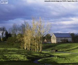 puzzel Landschap met een boerderij schuur