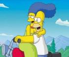 Homer en Marge Simpsons in motor
