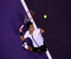Roger Federer de voorbereidingen om een hit te dienen