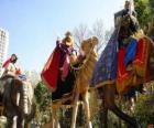 De drie wijzen berijden kamelen