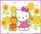 Hello Kitty met een drankje op het platteland met haar teddybeer Tiny Chum
