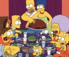 De familie Simpson op de dag van Thanksgiving waar families bijeen om te eten