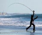 Vissers op het strand