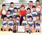 Het team van Captain Tsubasa met een trofee