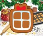 Biscuit met de vorm van een kerstcadeau