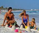 Familie op het strand