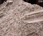 Het zand gebruikt in de bouw als een component voor beton en cement