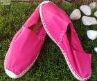 Een paar van roze espadrilles