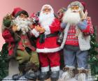 Drie Santa Claus poppen