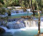 De Kuang Si Waterval, zijn een paar watervallen op verschillende niveaus, gelegen aan  ten zuiden van Luang Prabang, Laos