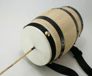 puzzel Rommelpot of foekepot, typische percussie-instrument dat met Kerstmis in Spanje