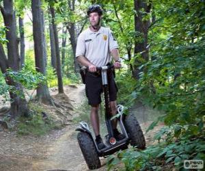 puzzel Segway, een elektrisch aangedreven, zelfbalancerend eenpersoons vervoermiddel