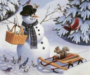puzzel Sneeuwman met een eekhoorn en een aantal vogels in de buurt