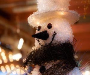 puzzel Sneeuwpop gezicht met muts en sjaal